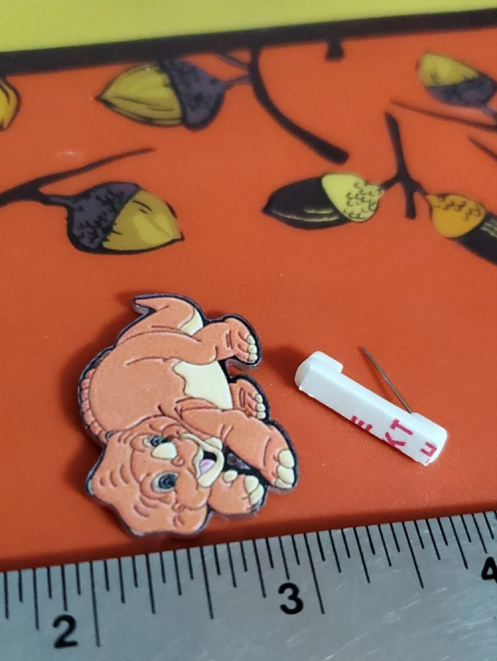 Cute Cartoon Baby Dinosaur Acrylic Pin - Orange & Cream